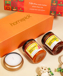 Two jars of jam and a candle 