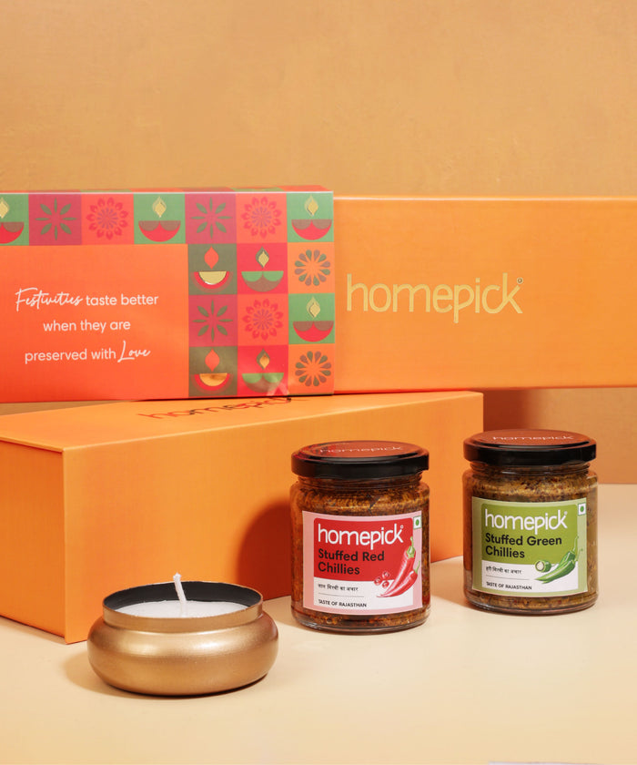 Homepick jars with a candle on an orange 